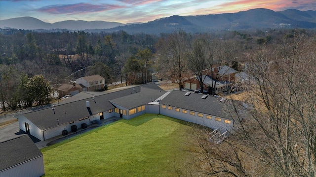 aerial view at dusk with a mountain view