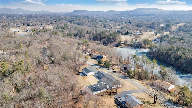 drone / aerial view featuring a mountain view