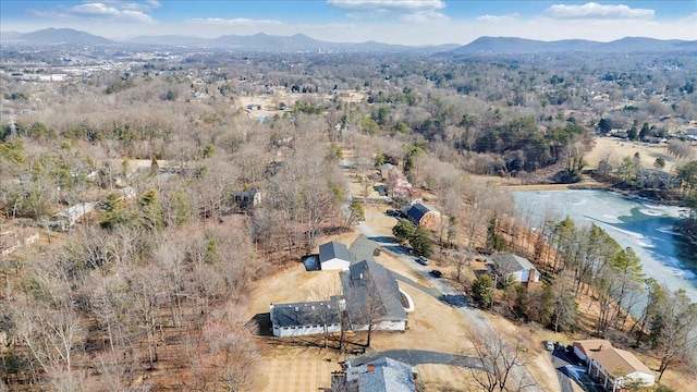 drone / aerial view featuring a mountain view