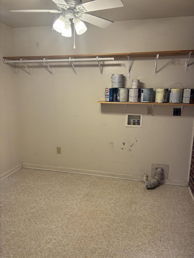 laundry area with washer hookup, laundry area, baseboards, and tile patterned floors