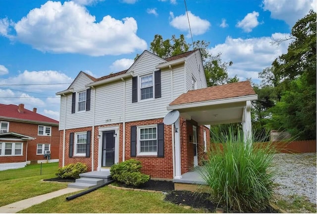 view of front of property with a front lawn