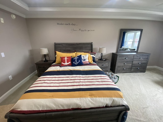 bedroom with carpet floors and crown molding