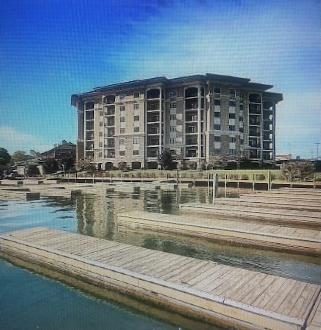 view of building exterior featuring a water view