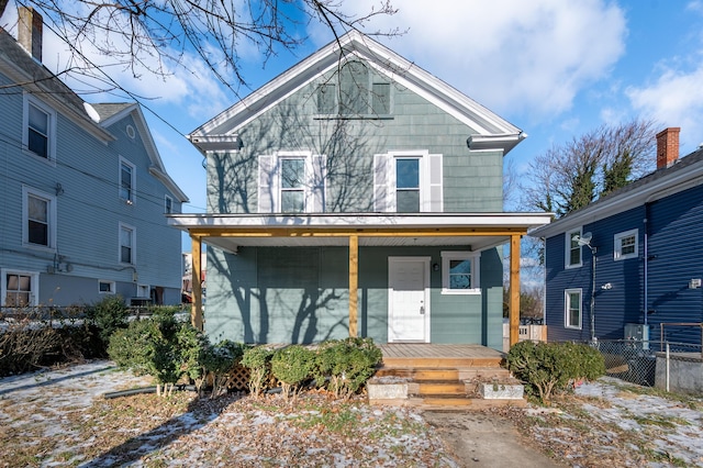 view of property featuring a porch