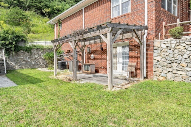 back of house featuring a patio area, central AC unit, a lawn, and a pergola