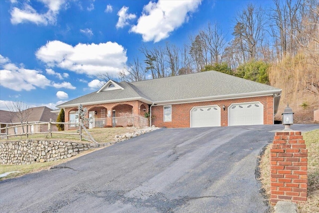 single story home with a garage