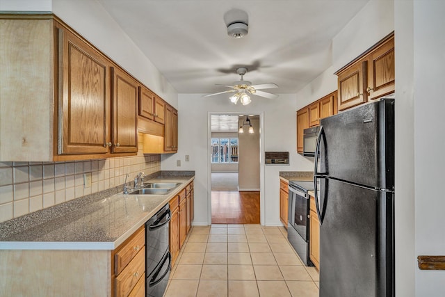 kitchen featuring backsplash, black appliances, sink, ceiling fan, and light tile patterned flooring