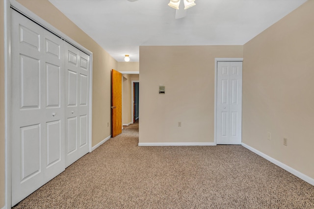 unfurnished bedroom featuring carpet flooring