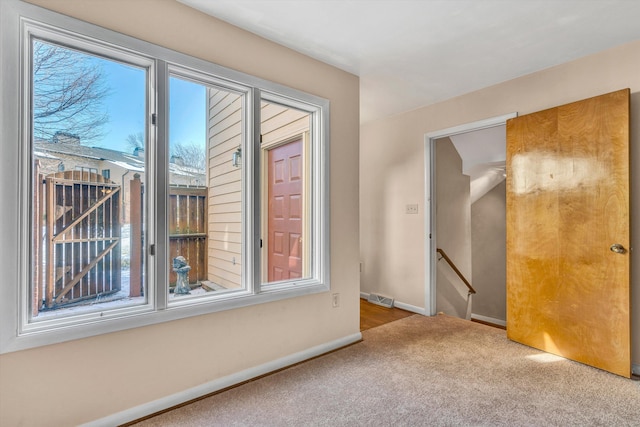 view of carpeted spare room