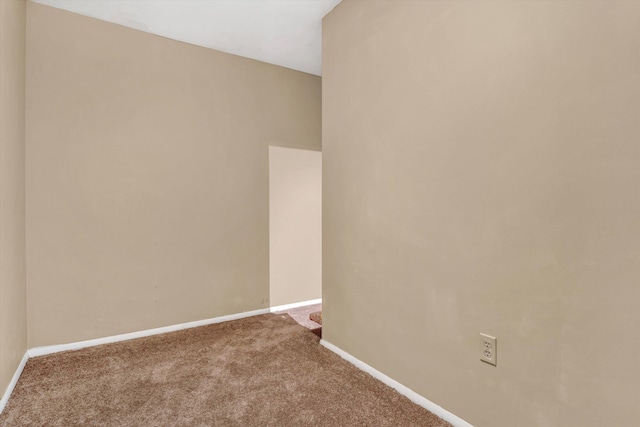 empty room featuring carpet flooring