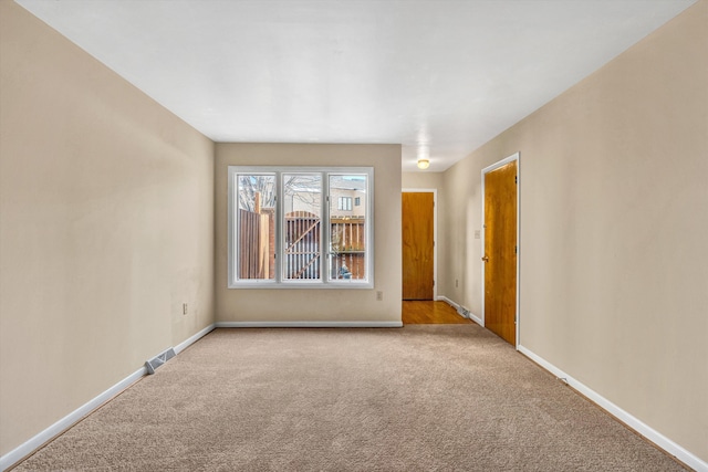 view of carpeted spare room