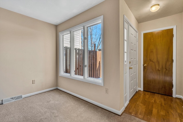 entryway featuring wood-type flooring