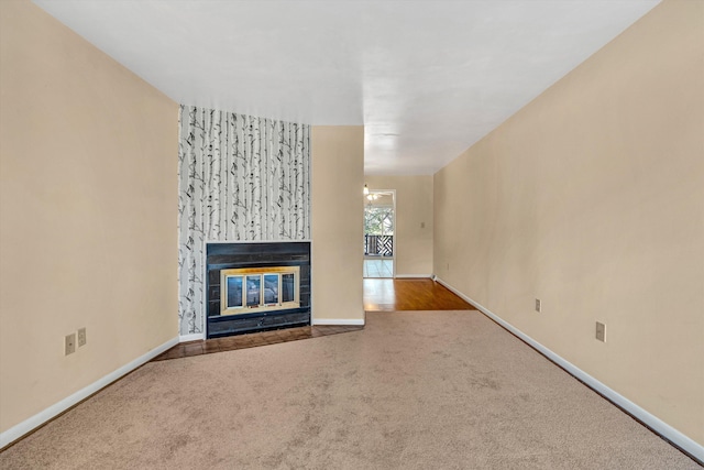 unfurnished living room with carpet