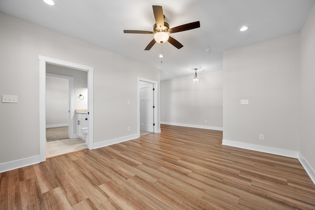 interior space featuring light hardwood / wood-style floors and ceiling fan