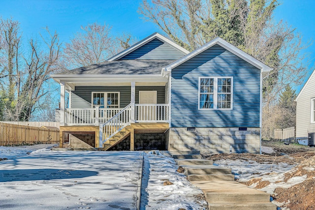 view of front of property featuring covered porch