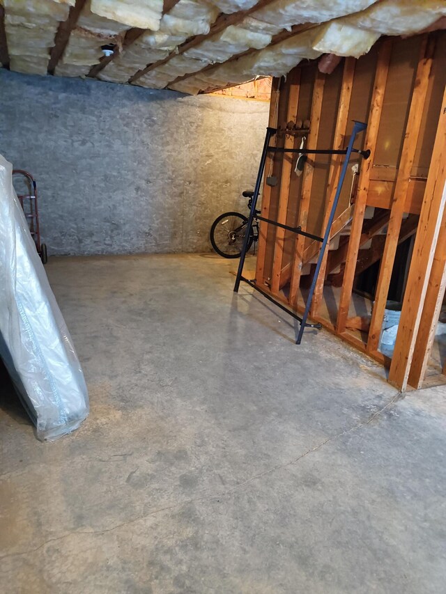 carpeted bedroom with a closet and ceiling fan