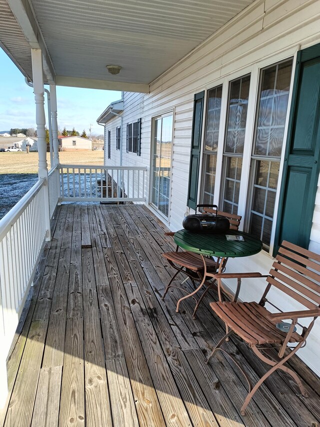 view of front of house featuring covered porch and a garage