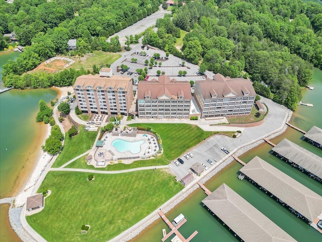 birds eye view of property with a water view