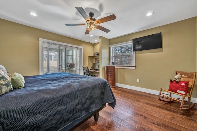 bedroom featuring hardwood / wood-style flooring, access to outside, and ceiling fan