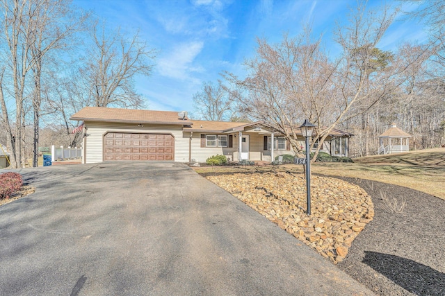 154 Brooks Point Ln, Union Hall, VA 24176 - ranch-style home with an attached garage, aphalt driveway, and a gazebo