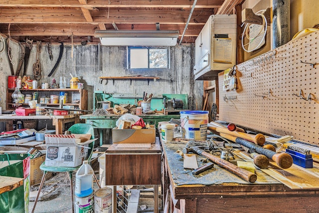 miscellaneous room featuring a workshop area