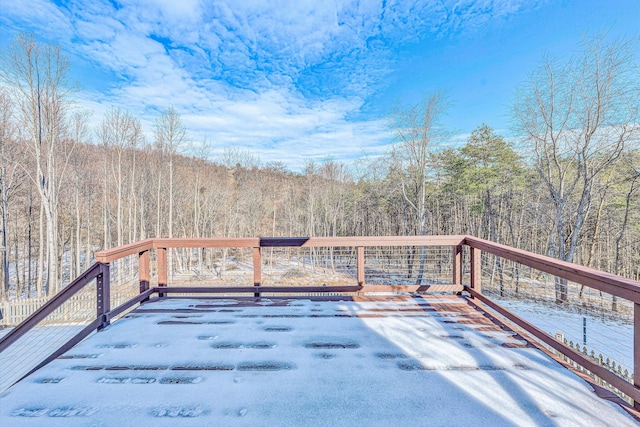 view of snow covered deck