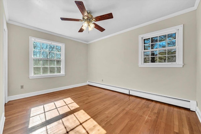 unfurnished room with ceiling fan, baseboard heating, crown molding, and light wood-type flooring