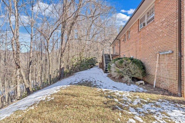 view of property exterior with a yard