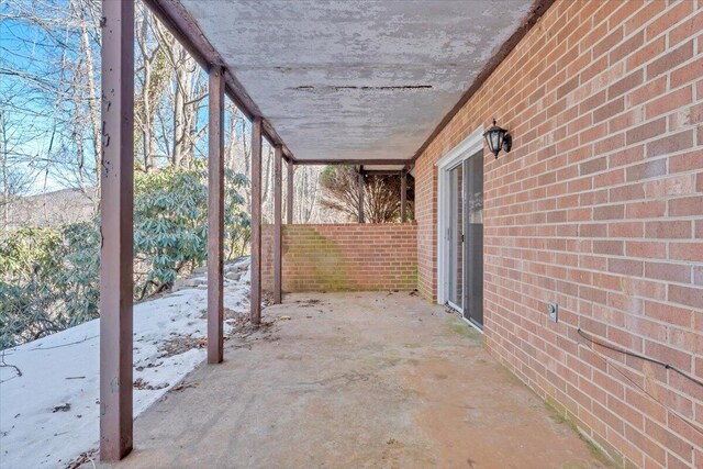 view of snow covered patio