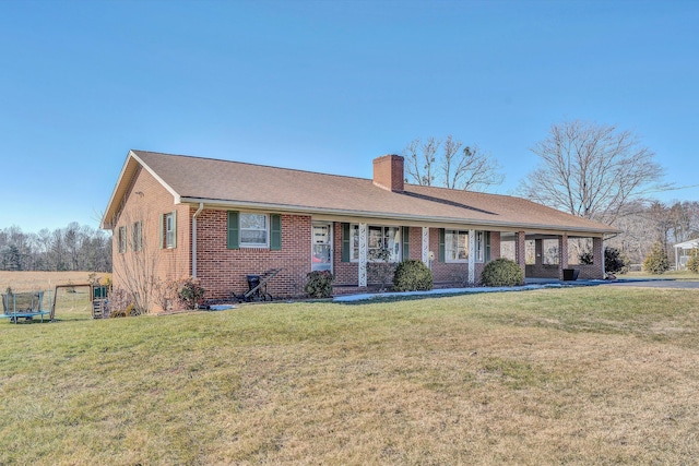 single story home with a front yard and a porch