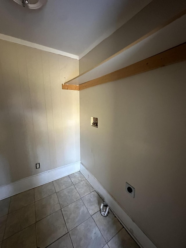 washroom with electric dryer hookup, hookup for a washing machine, and light tile patterned floors