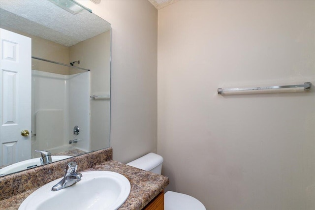 full bathroom with toilet, bathing tub / shower combination, and vanity