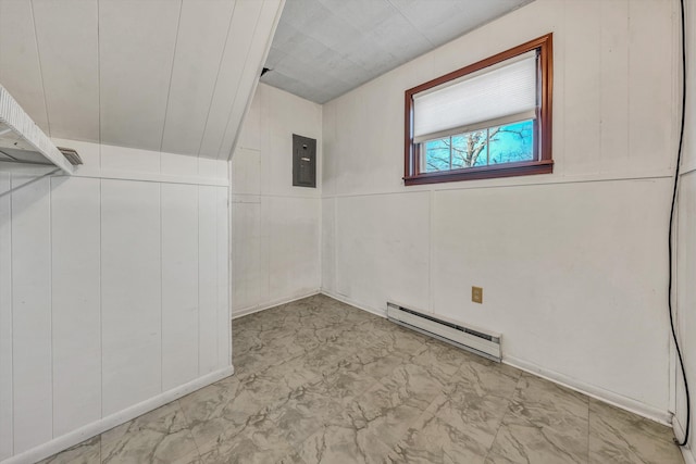 interior space with lofted ceiling, a baseboard radiator, and electric panel