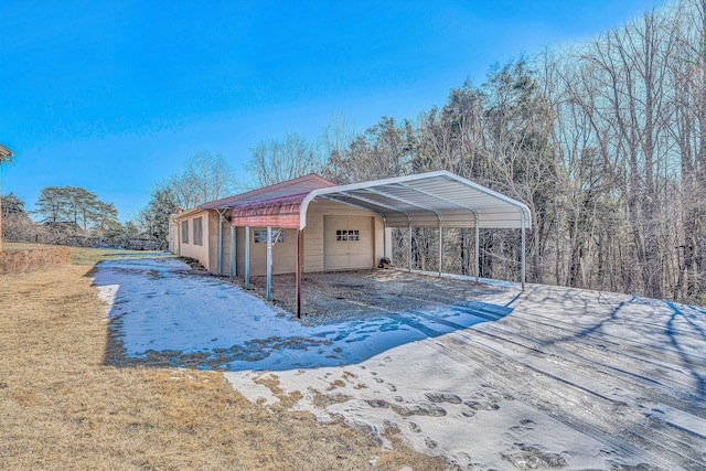 view of pool featuring a yard and a carport