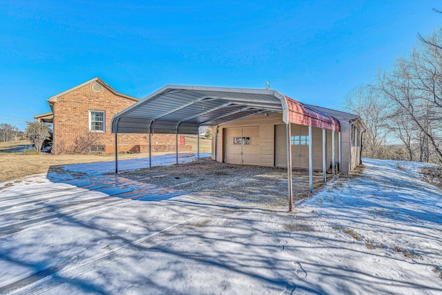 exterior space featuring a carport and a garage