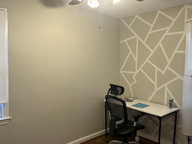 office space featuring ceiling fan