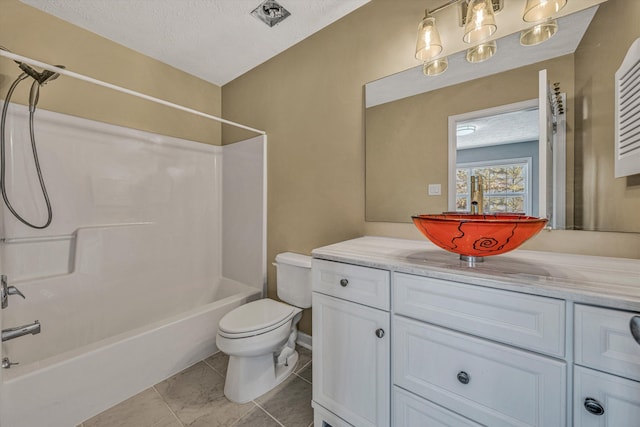 full bathroom featuring a textured ceiling, tile patterned floors, vanity, shower / bath combination, and toilet