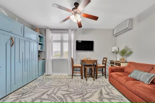 living room with a wall mounted air conditioner and ceiling fan