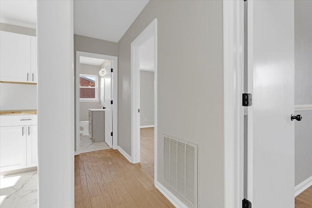 hall featuring light wood-type flooring