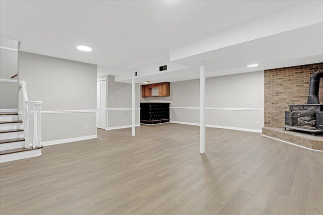 hallway with light hardwood / wood-style flooring