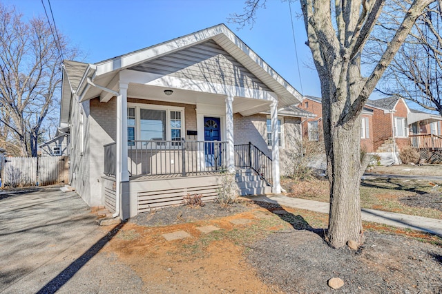 bungalow-style home with a porch