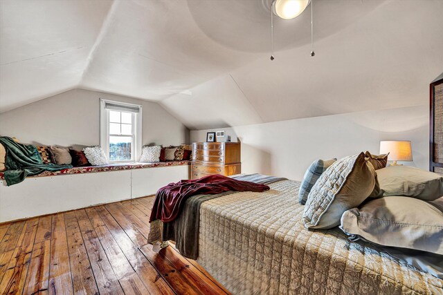 bedroom featuring hardwood / wood-style flooring and ceiling fan