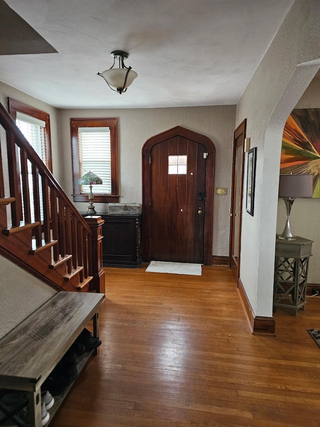 entrance foyer featuring hardwood / wood-style flooring