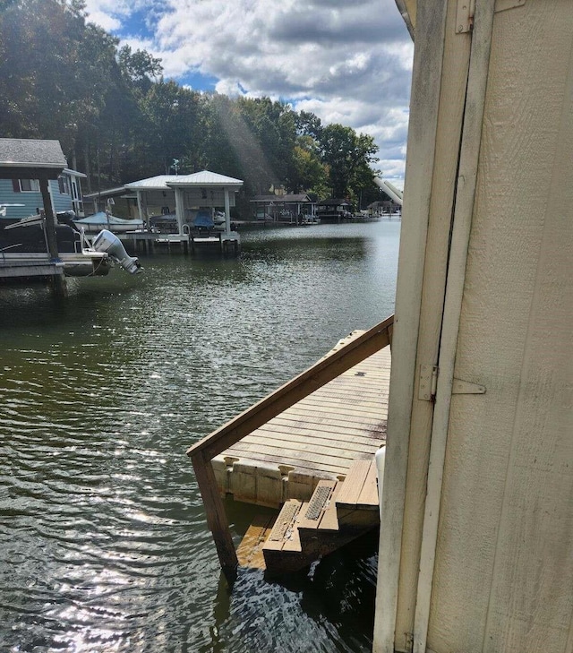 view of dock with a water view