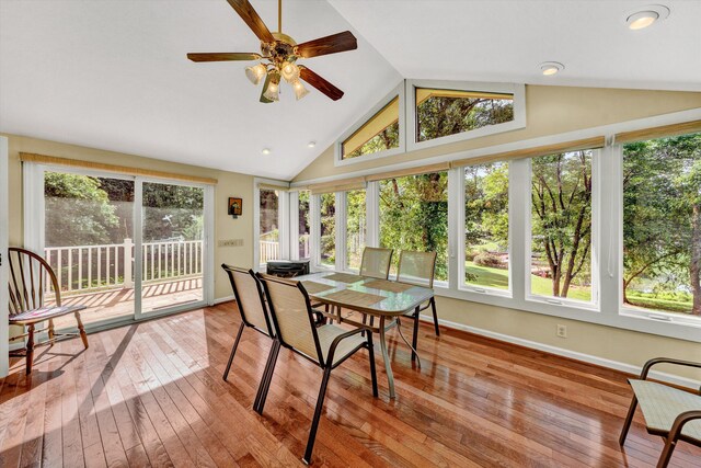 back of house featuring a sunroom and a yard