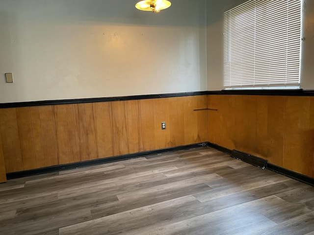 spare room featuring hardwood / wood-style floors