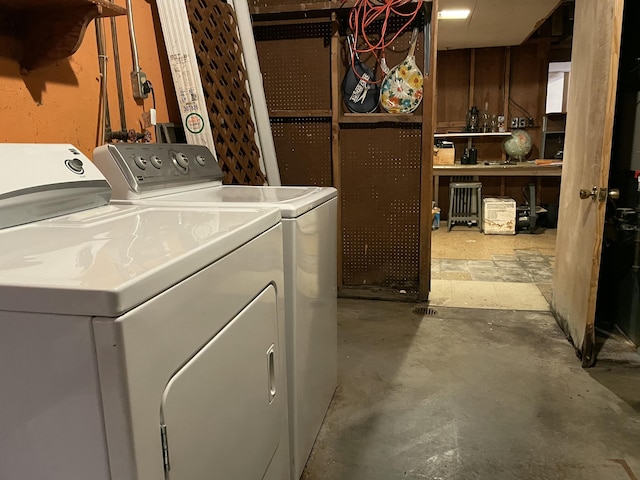 washroom with independent washer and dryer