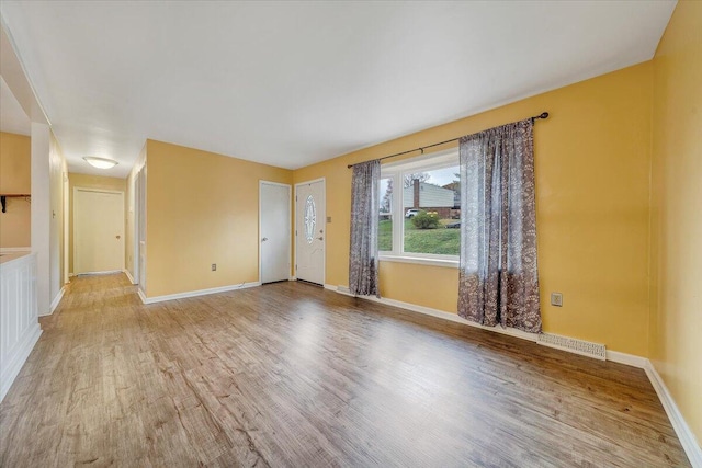 empty room featuring light wood-type flooring