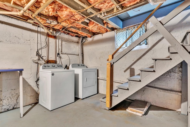 basement with washing machine and clothes dryer