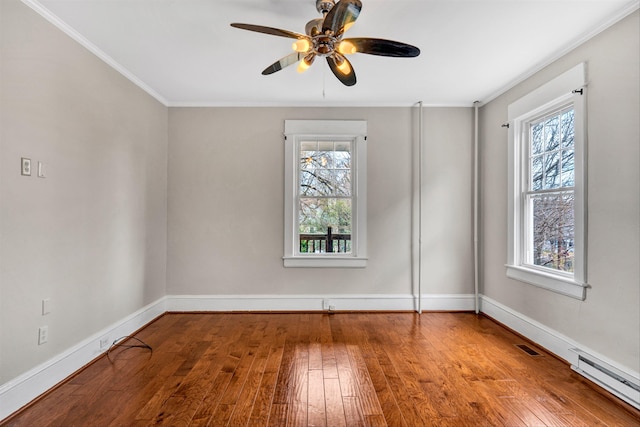 empty room with ceiling fan, a baseboard radiator, wood-type flooring, and ornamental molding